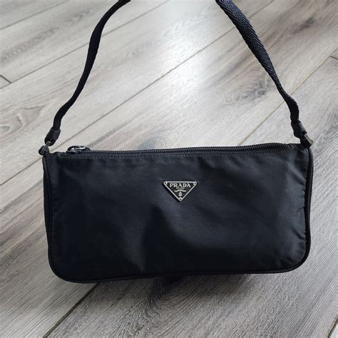 prada pochette bag|prada bag with small pouch.